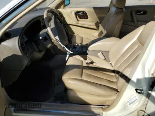 1994 Infiniti Q45 z VIN JNKNG01D3RM252218, wystawiony jako Copart lot #77230944 z przebiegiem 69 069 mil mil oraz Tytuł czysty. Historia ofert i sprzedaży dostępna na DreamBid. Obrazek 7.