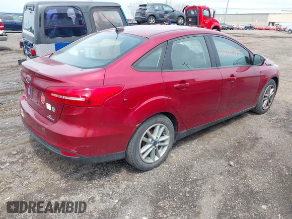 2015 Ford Focus SE with VIN 1FADP3F21FL296327, listed as a IAAI auction lot 42171777 with 122,135 mi miles and . Bid and sale history available at DreamBid. Image 4.