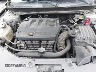 2009 Chrysler Sebring Touring with VIN 1C3LC56BX9N517563, listed as a IAAI auction lot 41853411 with 194,215 mi miles and . Bid and sale history available at DreamBid. Image 10.