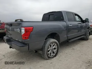 2020 Nissan Titan XD Platinum Reserve with VIN 1N6AA1FB1LN508112, listed as a Copart auction lot 84524154 with 60,342 mi miles and Salvage Title. Bid and sale history available at carsss.com. Image 3.