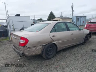 2002 Toyota Camry LE z VIN 4T1BE32K72U028489, wystawiony jako IAAI lot #41760604 z przebiegiem 163 950 mil mil oraz . Historia ofert i sprzedaży dostępna na DreamBid. Obrazek 4.