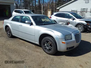 2009 Chrysler 300 Touring with VIN 2C3KA53V19H607225, listed as a IAAI auction lot 41822804 with 158,163 mi miles. Bid and sale history available at carsss.com. Image 1.