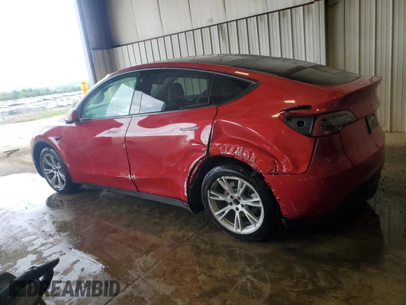 2023 Tesla Model Y Long Range z VIN 7SAYGAEE8PF701618, wystawiony jako Copart lot #57573875 z przebiegiem 39 463 mil mil oraz Szkoda całkowita • Salvage title. Historia ofert i sprzedaży dostępna na DreamBid. Obrazek 2.