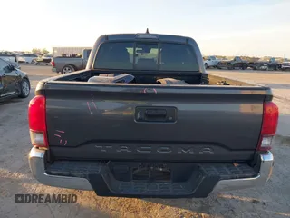 2021 Toyota Tacoma SR z VIN 3TYAX5GN2MT020997, wystawiony jako IAAI lot #40991578 z przebiegiem 81 509 mil mil oraz . Historia ofert i sprzedaży dostępna na DreamBid. Obrazek 16.