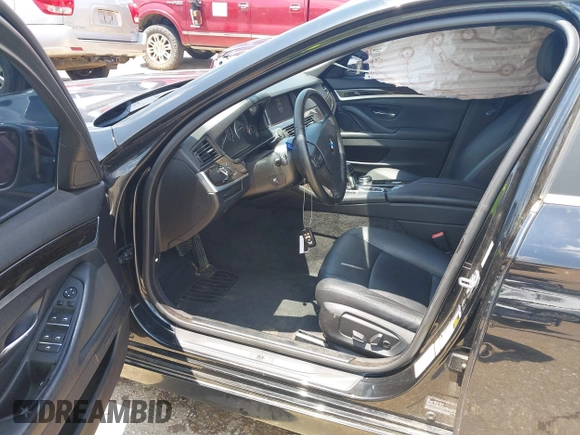 2014 BMW 5 Series 528i with VIN WBA5A5C59ED020624, listed as a IAAI auction lot 42581578 with 119,003 mi miles and . Bid and sale history available at DreamBid. Image 5.