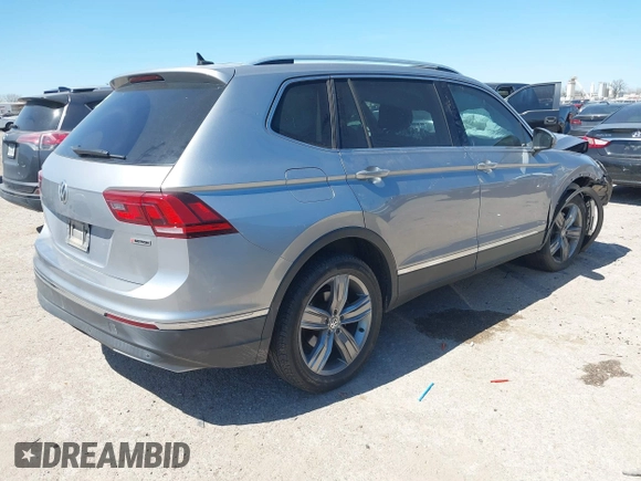 2019 Volkswagen Tiguan SEL Premium with VIN 3VV4B7AX5KM085435, listed as a IAAI auction lot 41839386 with 124,501 mi miles and . Bid and sale history available at DreamBid. Image 4.