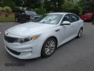 2016 Kia Optima EX with VIN 5XXGU4L33GG080449, listed as a Copart auction lot 61627205 with 154,294 mi miles and Clean title. Bid and sale history available at DreamBid. Image 2.