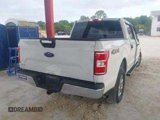 2019 Ford F-150 XL with VIN 1FTEW1E50KFA47687, listed as a IAAI auction lot 42021043 with 129,337 mi miles. Bid and sale history available at carsss.com. Image 4.