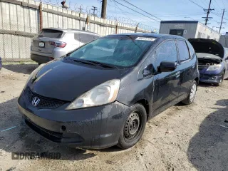 2009 Honda Fit with VIN JHMGE88289S057664, listed as a Copart auction lot 50015775 with 107,649 mi miles and Salvage Title. Bid and sale history available at carsss.com. Image 1.