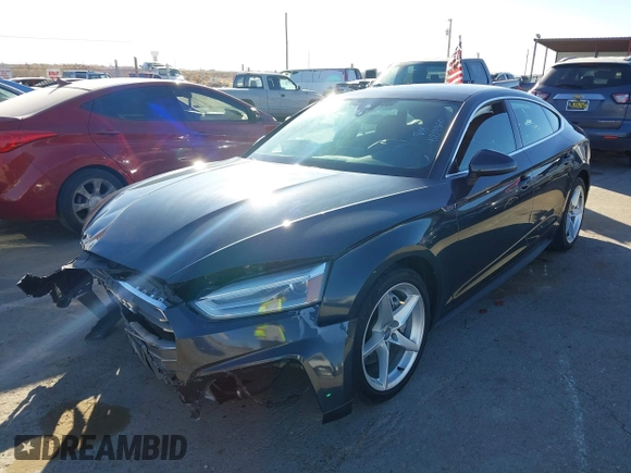 2018 Audi A5 Sportback Premium z VIN WAUDNCF52JA044291, wystawiony jako IAAI lot #41219360 z przebiegiem 86 273 mil mil oraz . Historia ofert i sprzedaży dostępna na DreamBid. Obrazek 2.