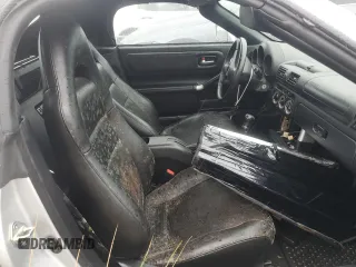 2003 Toyota MR2 z VIN JTDFR320330056176, wystawiony jako Copart lot #74517284 z przebiegiem 112 349 mil mil oraz Szkody całkowita. Historia ofert i sprzedaży dostępna na DreamBid. Obrazek 10.