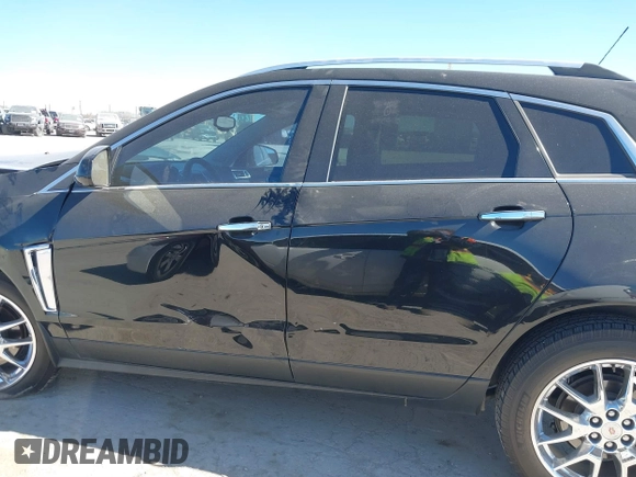 2015 Cadillac SRX Premium Collection with VIN 3GYFNDE33FS531081, listed as a IAAI auction lot 41763596 with 157,455 mi miles. Bid and sale history available at carsss.com. Image 15.