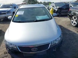 2012 Kia Forte SX with VIN KNAFW4A37C5621409, listed as a IAAI auction lot 41608698 with 202,731 mi miles. Bid and sale history available at carsss.com. Image 12.