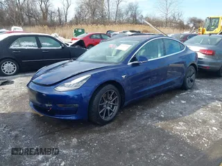 2018 Tesla Model 3 Long Range Battery with VIN 5YJ3E1EB8JF115138, listed as a IAAI auction lot 41343399 with 62,351 mi miles and . Bid and sale history available at DreamBid. Image 21.