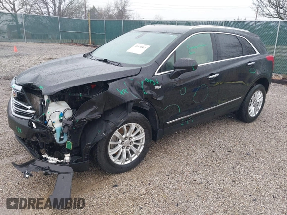 2018 Cadillac XT5 FWD with VIN 1GYKNARS6JZ160993, listed as a IAAI auction lot 41472847 with 113,415 mi miles. Bid and sale history available at carsss.com. Image 17.