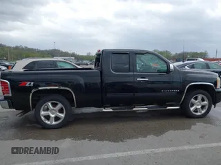 2009 Chevrolet Silverado 1500 LT with VIN 1GCEK29079Z199152, listed as a IAAI auction lot 41934658 with 129,864 mi miles. Bid and sale history available at carsss.com. Image 13.