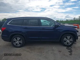 2016 Honda Pilot EX-L with VIN 5FNYF6H56GB073535, listed as a IAAI auction lot 42278814 with 111,156 mi miles and . Bid and sale history available at DreamBid. Image 14.