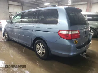 2005 Honda Odyssey EX-L with VIN 5FNRL38775B133803, listed as a Copart auction lot 51826685 with 141,867 mi miles and Salvage Title. Bid and sale history available at carsss.com. Image 2.