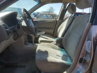 1998 Toyota Corolla VE with VIN 1NXBR18E6WZ080700, listed as a Copart auction lot 58605135 with 214,928 mi miles and Salvage title. Bid and sale history available at DreamBid. Image 7.