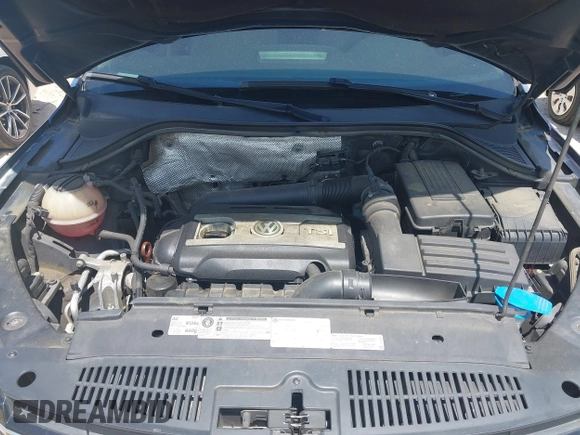 2012 Volkswagen Tiguan SE with VIN WVGAV7AX7CW534703, listed as a IAAI auction lot 42463358 with 119,699 mi miles and . Bid and sale history available at DreamBid. Image 10.