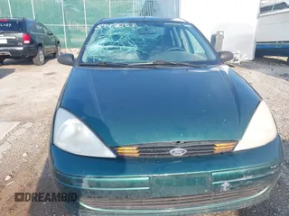 2000 Ford Focus SE with VIN 1FAFP3431YW273376, listed as a IAAI auction lot 39471057 with 214,968 mi miles and . Bid and sale history available at carsss.com. Image 6.