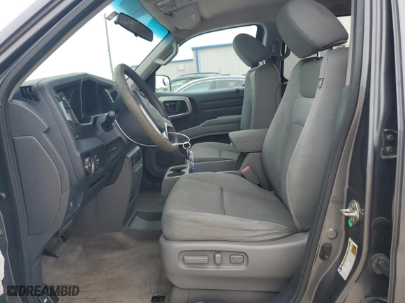 2012 Honda Ridgeline RTS with VIN 5FPYK1F46CB460256, listed as a Copart auction lot 70879644 with 136,217 mi miles and Salvage Title. Bid and sale history available at carsss.com. Image 7.