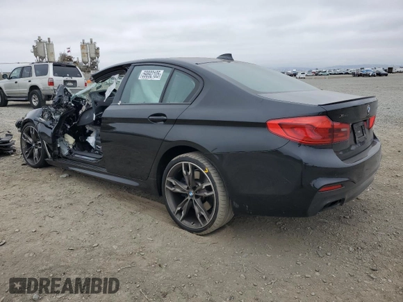 2019 BMW 5 Series M550i xDrive with VIN WBAJB9C53KB464298, listed as a Copart auction lot 59892105 with Not provided miles and Salvage title. Bid and sale history available at DreamBid. Image 2.