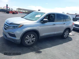 2016 Honda Pilot LX with VIN 5FNYF5H10GB044006, listed as a IAAI auction lot 42075404 with 129,642 mi miles and . Bid and sale history available at DreamBid. Image 14.