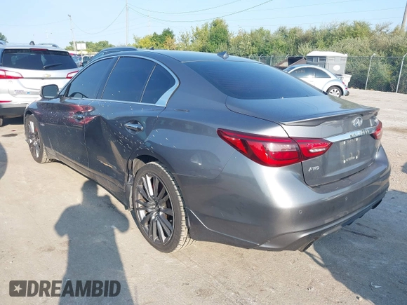 2020 Infiniti Q50 Red Sport 400 with VIN JN1FV7AR8LM660823, listed as a IAAI auction lot 40322341 with 104,530 mi miles and . Bid and sale history available at carsss.com. Image 3.
