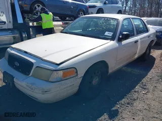 2010 Ford Crown Victoria with VIN 2FABP7AV6AX138688, listed as a IAAI auction lot 41774614 with 999,999 mi miles. Bid and sale history available at carsss.com. Image 2.