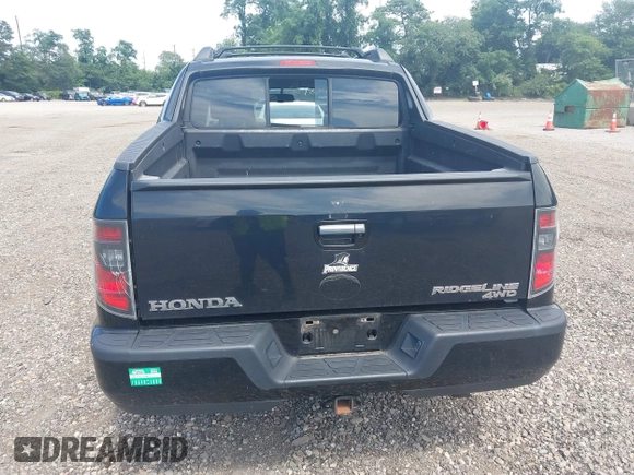 2014 Honda Ridgeline Sport with VIN 5FPYK1F71EB003710, listed as a IAAI auction lot 42777931 with 126,755 mi miles and . Bid and sale history available at DreamBid. Image 16.