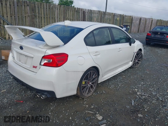 2021 Subaru WRX STI z VIN JF1VA2S69M9816079, wystawiony jako IAAI lot #42453417 z przebiegiem 19 481 mil mil oraz . Historia ofert i sprzedaży dostępna na DreamBid. Obrazek 4.
