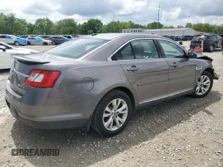 2011 Ford Taurus SEL z VIN 1FAHP2EWXBG190610, wystawiony jako Copart lot #56993785 z przebiegiem 119 784 mil mil oraz Szkoda całkowita • Salvage title. Historia ofert i sprzedaży dostępna na DreamBid. Obrazek 3.