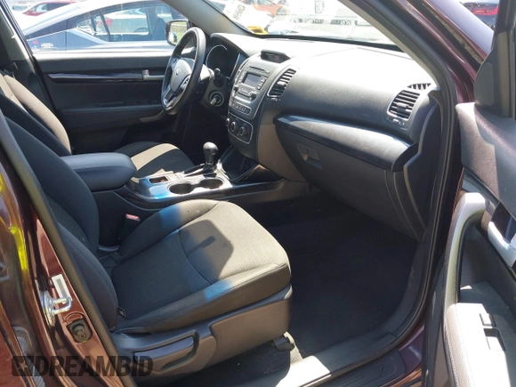 2015 Kia Sorento LX with VIN 5XYKTDA70FG604220, listed as a IAAI auction lot 42060598 with 128,180 mi miles and . Bid and sale history available at DreamBid. Image 5.