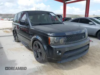2013 Land Rover Range Rover Sport SC with VIN SALSH2E40DA799828, listed as a IAAI auction lot 42146561 with 163,740 mi miles. Bid and sale history available at carsss.com. Image 1.