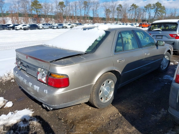 2001 Cadillac Seville Luxury SLS w/Monochrome Pkg with VIN 1G6KS54YX1U103892, listed as a IAAI auction lot 41550499 with 999,999 mi miles. Bid and sale history available at carsss.com. Image 4.
