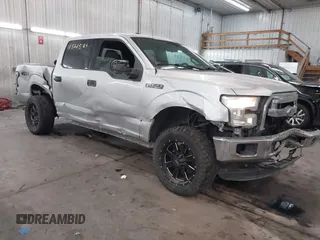 2015 Ford F-150 XLT with VIN 1FTEW1E89FFA44710, listed as a IAAI auction lot 41521584 with 158,297 mi miles. Bid and sale history available at carsss.com. Image 1.