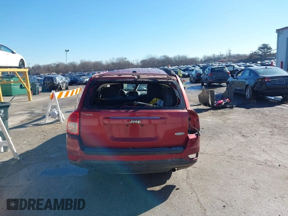 2014 Jeep Compass High Altitude with VIN 1C4NJCEA3ED539489, listed as a IAAI auction lot 41653313 with 124,462 mi miles. Bid and sale history available at carsss.com. Image 16.