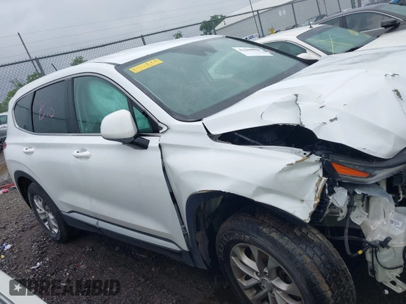 2019 Hyundai Santa Fe SE with VIN 5NMS2CAD1KH032805, listed as a IAAI auction lot 42385798 with Not provided miles and . Bid and sale history available at DreamBid. Image 12.
