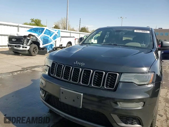 2019 Jeep Grand Cherokee Limited with VIN 1C4RJFBG6KC824278, listed as a Copart auction lot 54419665 with 181,525 mi miles and Salvage title. Bid and sale history available at DreamBid. Image 14.