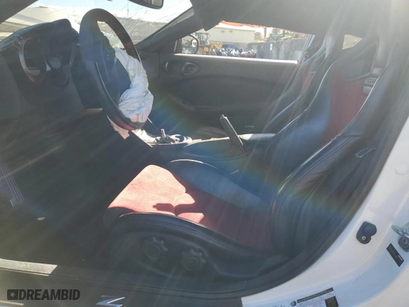 2018 Nissan 370Z Coupe NISMO with VIN JN1AZ4EH5JM571545, listed as a Copart auction lot 79937834 with 0 mi miles and Salvage Title. Bid and sale history available at carsss.com. Image 7.