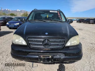 1999 Mercedes-Benz M 320/430/500 z VIN 4JGAB72E7XA094491, wystawiony jako Copart lot #57490025 z przebiegiem 194 406 mil mil oraz Szkoda całkowita • Salvage title. Historia ofert i sprzedaży dostępna na DreamBid. Obrazek 5.
