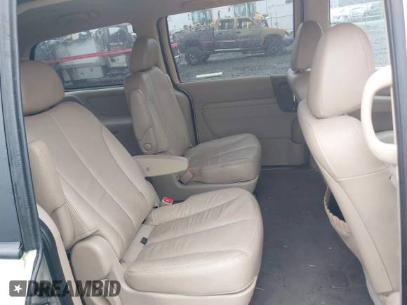 2011 Kia Sedona EX with VIN KNDMH4C73B6373513, listed as a IAAI auction lot 40725087 with 190,859 mi miles. Bid and sale history available at carsss.com. Image 8.