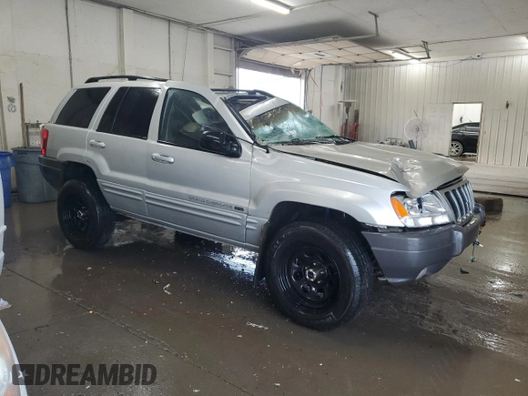 2002 Jeep Grand Cherokee Limited z VIN 1J8GW58S02C279251, wystawiony jako Copart lot #61563465 z przebiegiem 182 244 mil mil oraz Szkoda całkowita • Salvage title. Historia ofert i sprzedaży dostępna na DreamBid. Obrazek 4.