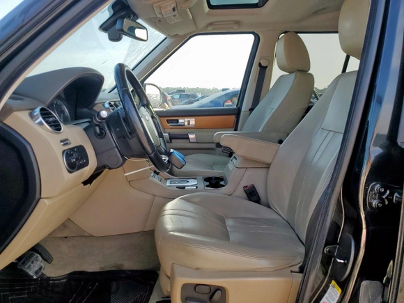 2014 Land Rover LR4 HSE with VIN SALAG2V66EA701306, listed as a Copart auction lot 65389665 with 142,135 mi miles and Clean title. Bid and sale history available at DreamBid. Image 7.