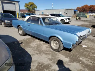 1966 Oldsmobile Cutlass z VIN 338676M337914, wystawiony jako Copart lot #77462934 z przebiegiem 66 826 mil mil oraz Szkody całkowita. Historia ofert i sprzedaży dostępna na DreamBid. Obrazek 4.