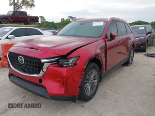 2024 Mazda CX-90 Preferred with VIN JM3KKBHDXR1114186, listed as a IAAI auction lot 41877143 with 29,500 mi miles and . Bid and sale history available at DreamBid. Image 2.