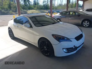 2010 Hyundai Genesis Coupe Grand Touring with VIN KMHHU6KH3AU017247, listed as a IAAI auction lot 42715001 with 153,442 mi miles and . Bid and sale history available at DreamBid. Image 1.