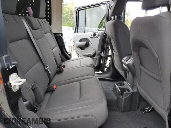 2023 Jeep Wrangler Sport S with VIN 1C4HJXDN6PW618252, listed as a Copart auction lot 55939455 with 69,681 mi miles and Salvage title. Bid and sale history available at DreamBid. Image 11.