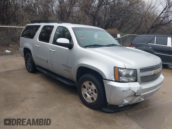 2014 Chevrolet Suburban LS with VIN 1GNSCHE08ER217393, listed as a IAAI auction lot 41563635 with 212,852 mi miles. Bid and sale history available at carsss.com. Image 1.